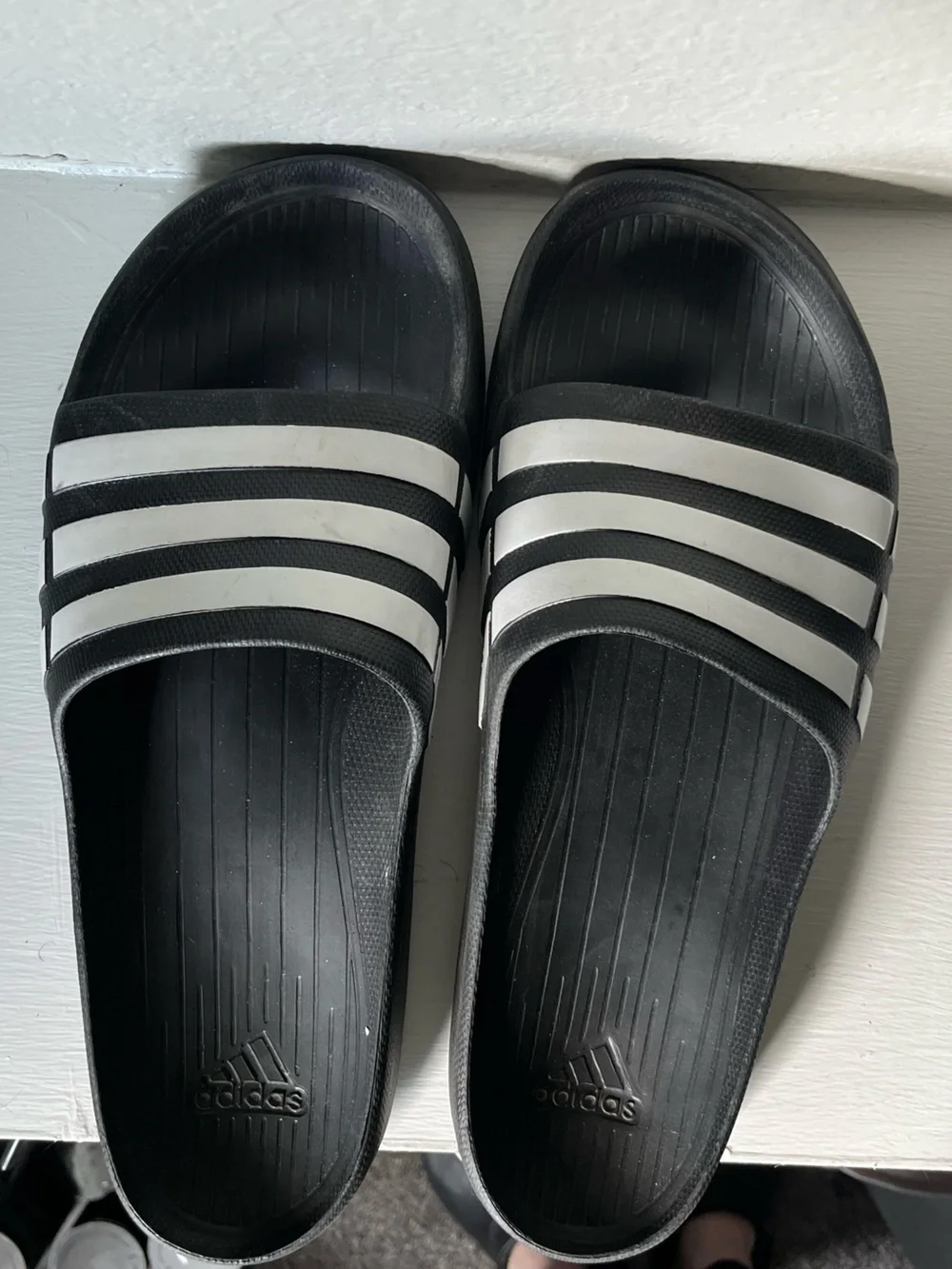 adidas Black Slides with White Stripes